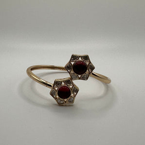 Delicate bangle with red stone