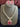 Pink doublet CZ necklace set with matching stud earrings on display stand