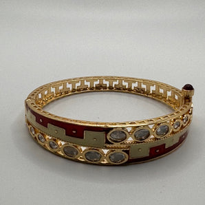 Gold, red and white cuff style bracelet with a hint of traditional elements DW inspired