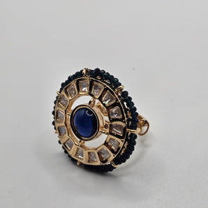 Mona lisa center stone blue onix on the side ring