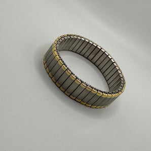 Expandable wrist bracelet w gold and gunmetal finish