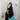 Model wearing pure Gajji silk bandhani saree in black with turquoise tie-dye dots and turquoise mint tissue pallu