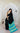 Model wearing pure Gajji silk bandhani saree in black with turquoise tie-dye dots and turquoise mint tissue pallu