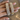 White CZ oval statement bangles held by a jewelry model