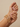 Model wearing antique gold American diamond floral bangles on her wrist