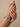 Model wearing multicolour stone CZ bangles on her wrist