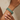 Model wearing emerald green oval CZ bangles on her wrist