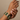Model wearing emerald green cushion stone bangles on her wrist