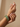 Model wearing slim emerald green CZ bangle set on her wrist