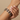 Model wearing sapphire blue cushion stone bangles on her wrist