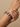 Model wearing sapphire blue cushion stone bangles on her wrist