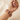 Model wearing ruby red cushion stone bangles on her wrist