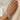 Model wearing silver tone baguette mosaic CZ bangles on her wrist