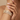 Model wearing champagne CZ cluster bangle set on her wrist