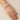 Model wearing round solitaire CZ bangles on her wrist