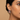 Model wearing the multicolor CZ baguette hoop earring