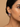 Model wearing the multicolor CZ baguette hoop earring