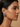 Model wearing the antique gold semi-precious flower stud earring