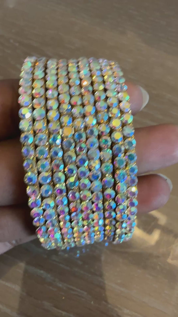 Video of iridescent AB crystal bangle set shimmering with rainbow sparkle