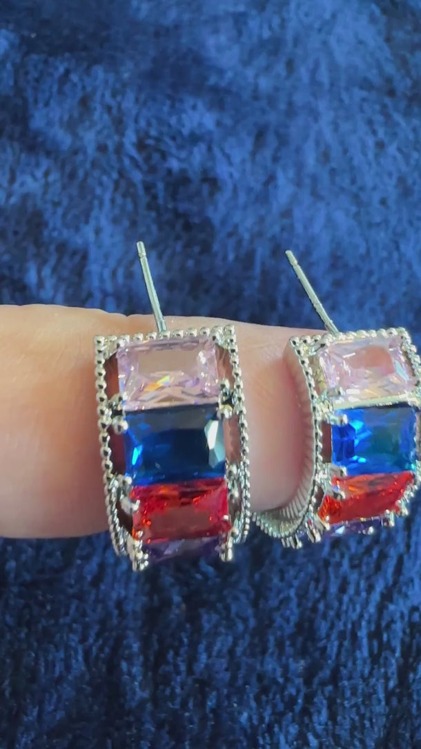 Video of multicolor CZ baguette hoop earrings with soft background music