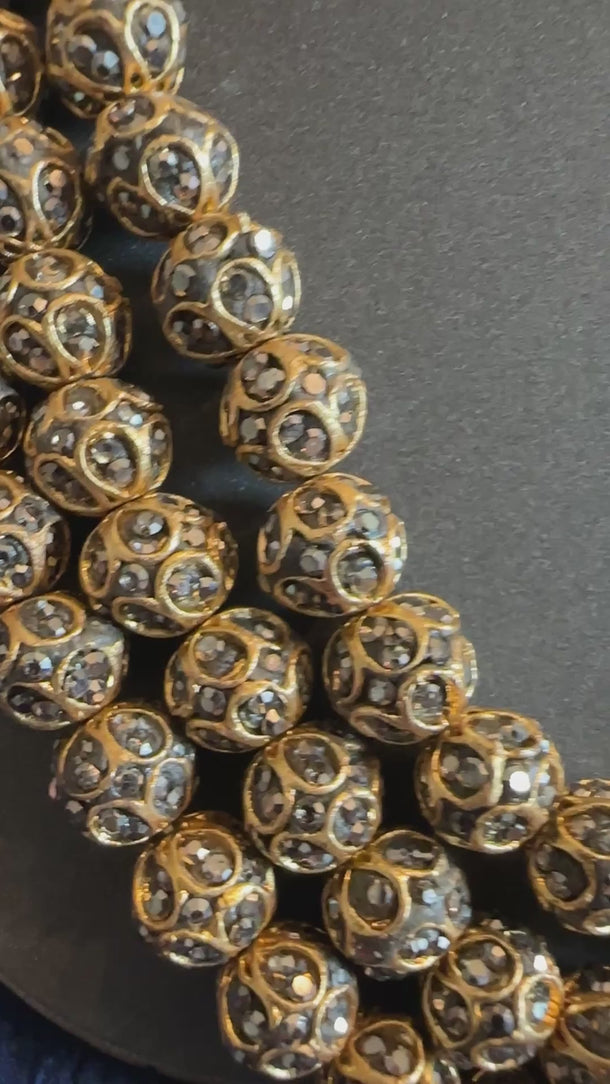 Video of the gold 3-strand crystal beaded mala with jhumka earrings, soft background music
