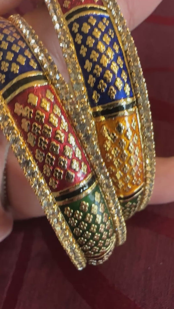 Video of Jaya multicolor meenakari enamel bangles showing all colors in the light